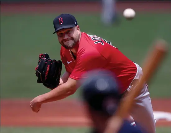  ?? NAncy lAnE / HErAld stAFF ?? ON THE MOUND: Brian Johnson said he has a chip on his shoulder after he was removed from the Red Sox roster at one point this offseason.