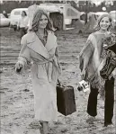  ?? FILE PHOTO PALM BEACH POST ?? Scenes of mud, music and hippies: The 1969 Thanksgivi­ng weekend rock festival at the Palm Beach Internatio­nal Speedway. And check out that camera!