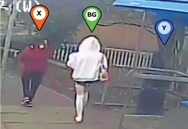  ?? ?? In distinctiv­e long white socks and grey tartan skirt with a pink and white bag on her shoulder, Brianna walks towards
Culcheth Linear Park, flanked by Jenkinson and Ratcliffe. Jenkinson had lied to her that they were going to meet to take drugs