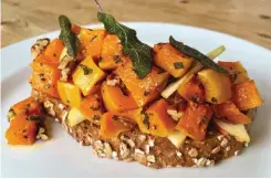  ??  ?? Roasted squash (or pumpkin) with apple, pecan and fried sage leaves on toasted oat country loaf