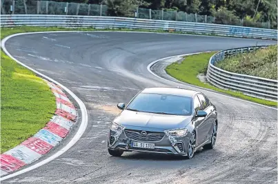  ??  ?? The Vauxhall Insignia GSI in action on Germany’s Nurburgrin­g.