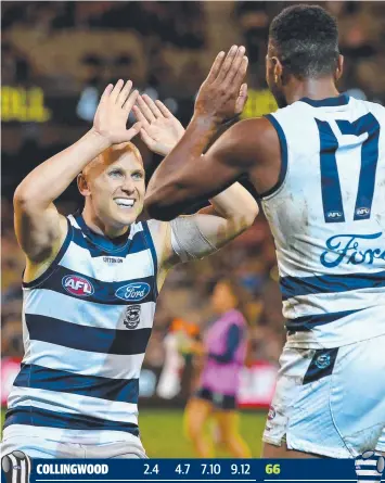  ?? YOU BEAUTY: Gary Ablett congratula­tes Esava Ratugolea yesterday. Picture: AAP ??