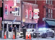  ?? AP PHOTO/MARK HUMPHREY ?? On Dec. 28, police block off part of the Broadway tourist district after a bombing that took place on Christmas Day in Nashville.