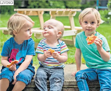  ??  ?? Three is a magic number: brothers Alfie, left, and Hector, right, are protective of their younger brother Horatio