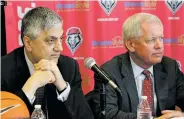  ?? SUSAN MONTOYA BRYAN/ASSOCIATED PRESS FILE PHOTO ?? University of New Mexico acting President Chaouki Abdallah, left, and athletics director Paul Krebs listen to questions on May 3 during a news conference in Albuquerqu­e. Krebs, the head of UNM’s athletics department, is drawing criticism as details...