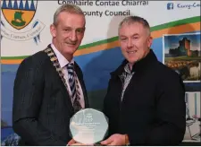  ?? Cllr Mike Kennelly honours Paul Donegan. Photos by Domnick Walsh. ??