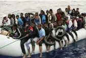  ?? AP ?? Migrants intercepte­d by the Libyan coastguard near the western city of Garabulli