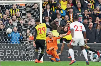  ?? AP ?? Watford’s Etienne Capoue scores a goal against Crystal Palace during the FA Cup quarterfin­al on Saturday. —