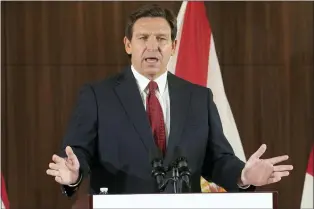  ?? MARTA LAVANDIER — THE ASSOCIATED PRESS FILE ?? Florida Gov. Ron DeSantis speaks at a news conference on Jan. 26, 2023, in Miami. David McIntosh, the president of the influentia­l Club For Growth group, said Tuesday, Feb. 7, that the group has invited a half dozen potential Republican candidates for the White House to its donor summit in Florida next month including DeSantis.