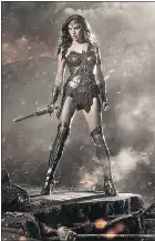  ?? — WARNER BROS ?? ‘I think it is so important for girls and boys to have a female (who is) a strong superhero to look up to,’ Gal Gadot says.