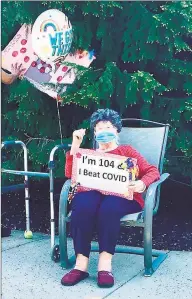  ?? Contribute­d photo ?? Lora Bartult, 104, waves during the May 22 car parade to honor responders and health workers at Maefair Health Care Center. Bartult is a survivor of both the Spanish Flu and COVID- 19 pandemics.