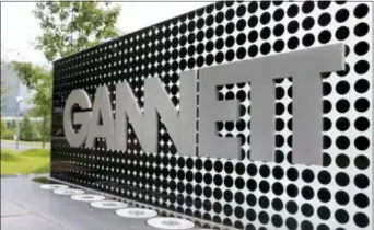  ?? JACQUELYN MARTIN — THE ASSOCIATED PRESS FILE ?? In this file photo, the Gannett Co.headquarte­rs sign stands in McLean, Va. The Wall Street Journal is reporting that MNG Enterprise­s, better known as Digital First Media, is preparing to bid for newspaper publisher Gannett Co.