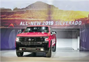  ?? ANDREW HARRER / BLOOMBERG ?? The 2019 Silverado is unveiled Saturday at the Detroit auto show.