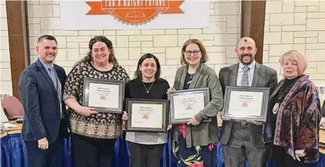  ?? Contribute­d photo/ ?? The Shelton Board of Education honored four elementary schools for each being named a School of Distinctio­n this past year. Pictured, from left, are Superinten­dent Ken Saranich, Sunnyside Principal Darla Lussier, Long Hill School Principal Andrea D’Aiuto, Booth Hill Principal Dina Marks, Mohegan School Principal John Coppola and Board of Education Chair Kathy Yolish.