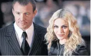  ??  ?? Director Guy Ritchie and ex-wife Madonna in happier times in 2008.