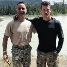  ?? JOANNE IRELAND/EDMONTON JOURNAL ?? U.S. Army Ranger Lucas Carr, left, and Oilers captain Andrew Ference organized an expedition for the team’s prospects.