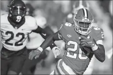  ?? BRYNN ANDERSON/AP PHOTO ?? Clemson running back Kobe Pace (20) runs the ball against Wake Forest during the second half of Saturday’s game in Clemson, S.C.