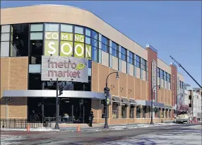  ??  ?? The new Metro Market on N. Oakland Ave. underscore­s Roundy’s continuing effort to revitalize itself and reclaim market share in Milwaukee.