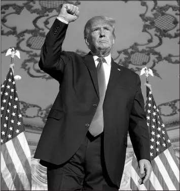 ?? ANDREW HARNIK / ASSOCIATED PRESS ?? Former President Donald Trump gestures Tuesday at Mar-a-lago in Palm Beach, Fla., after announcing that he is running for president for the third time.