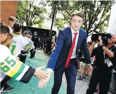  ?? RON JENKINS/GETTY IMAGES ?? Noah Dobson was singled out for praise by Team Canada coach Tim Hunter after a 4-3 overtime win against Finland.