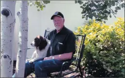  ?? JACK JENNINGS/TRIBUNE NEWS SERVICE ?? Jack Jennings with his dog, Maggie Mae, who discovered cash in a frozen snowbank, the first of many blessings, the Colorado native said.