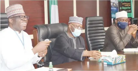  ??  ?? L-R: Yakubu Oseni, chairman, Senate Committee on ICT and Cyber Crime; Mahmood Yakubu, INEC chairman, and Hassan Hadija, member of the committee, during members of the committee’s visit to INEC headquarte­rs in Abuja.