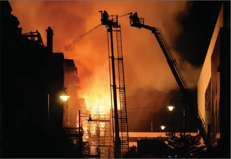  ??  ?? Above: The world-famous Mackintosh building at Glasgow School of Art suffered two catastroph­ic fires, in 2014 and 2018.