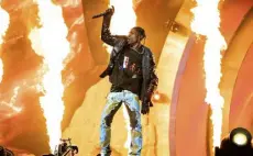  ?? Amy Harris, Invision ?? Travis Scott performs at the Astroworld Music Festival in Houston, Nov. 5, 2021.