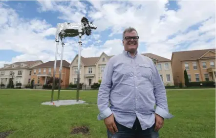  ?? STEVE RUSSELL/ TORONTO STAR ?? After some Markham residents complained about a cow statue in their neighbourh­ood, Zane Caplansky said he’d be glad to give it a home outside his restaurant.