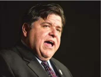  ?? ASHLEE REZIN/SUN-TIMES ?? Gov. J.B. Pritzker reached an agreement with SEIU Healthcare Illinois that will give more then 40,000 home and child care providers raises.