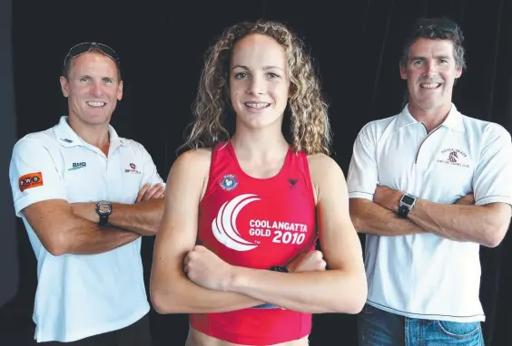  ??  ?? Jordan Mercer, with her late uncle Dean (left) and father Darren seven years ago, will compete at the world paddleboar­d championsh­ips this week.