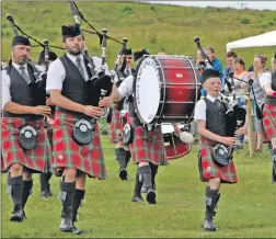  ??  ?? Mull and Iona Pipe Band open the Morvern Games.