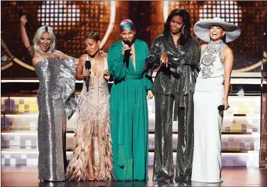  ?? KEVIN WINTER — GETTY IMAGES ?? Lady Gaga, from left, Jada Pinkett Smith, Alicia Keys, Michelle Obama and Jennifer Lopez onstage during the 61st annual Grammy Awards at Staples Center in Los Angeles on Sunday.