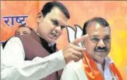  ?? ANSHUMAN POYREKAR/HT FILE ?? Former Congress leader Rajendra Dhedya Gavit (right) from Palghar joined the BJP on Tuesday.