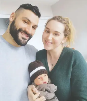  ??  ?? Ettore Lattanzio and wife Julie pose with their son Rosario, born a week ago and named after Ettore’s late father.