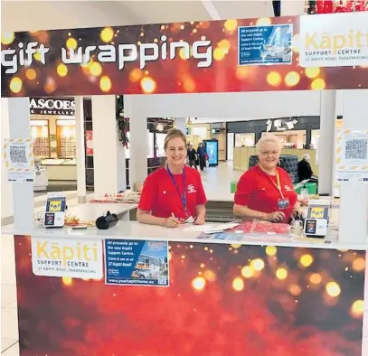  ?? ?? Judith Langridge, left, and Heather Fagg at a gift wrapping booth in Coastlands last year.