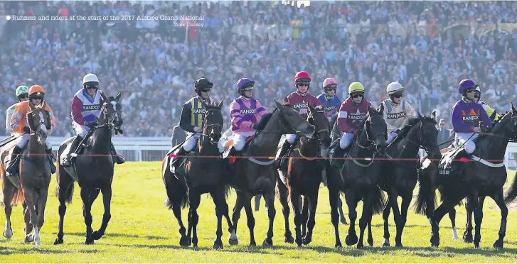  ?? Alex Livesey ?? Runners and riders at the start of the 2017 Aintree Grand National