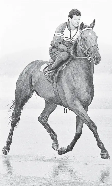  ?? PHOTO: ODT FILES ?? Stride of a champion . . . Bonecrushe­r enjoys the sand of Ocean View Beach in 1988.