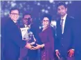  ?? ?? Mr. Ritesh Singhal (MD) and Mr. V. Chandrakan­th (CEO) receiving the award at the 31st National Chamber of Exporters Awards 2023