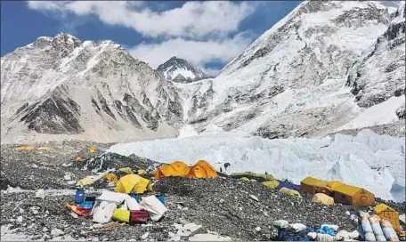  ?? Ben Weissenbac­h For The Times ?? THE NUMBER of annual visitors to Nepal’s Sagarmatha National Park, home to Mt. Everest, grew from about 5,000 in 1981, to 32,000 in 2010, to 58,000 in 2018 — and there seemed no reason to doubt the boom would continue — until 2020. Above, Everest base camp, 17,600 feet.