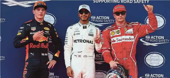  ?? [ FOTO LUQMAN HAKIM ZUBIR/BH ] ?? Hamilton (tengah) mencatat masa terpantas sesi kelayakan GP Malaysia manakala Raikkonen (kanan) di tempat kedua dan ketiga milik Verstappen.