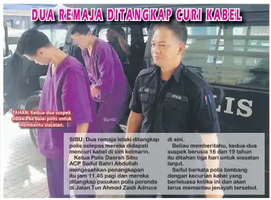  ??  ?? TAHAN: Kedua-dua suspek dibawa ke balai polis untuk membantu siasatan.