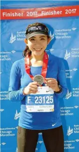  ?? JENNY HARTANTO FOR JAWA POS ?? PUAS: Medali pertama Jenny Hartanto dalam kategori full marathon di event Chicago Marathon 2017.