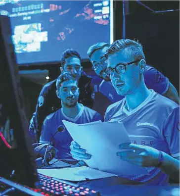  ??  ?? SCREEN ASSAULT: Full-time eSports player Ruan van Wyk, right, spends between six and eight hours a day playing CS:GO, and it paid off when his team, Bravado, won the R350 000 first-place prize at a tournament two weeks ago