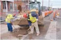  ?? GREG SORBER/JOURNAL ?? Crews are pictured in December working on the Albuquerqu­e Rapid Transit project on Central Avenue.