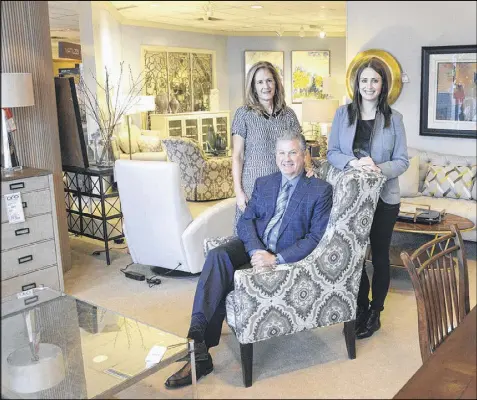  ?? LAKE FONG / PITTSBURGH POST-GAZETTE ?? Jeff Lenchner is president of the Today’s Home chain of furniture stores, a company establishe­d by his parents 63 years ago. His wife, Jill, (left) and daughter Rachel also help handling the business.