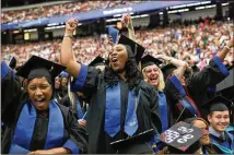  ?? AJC ?? The GOP rewrite of the federal Higher Education Act promotes more short-term credential­ing programs, but Georgia needs more college graduates, like these students at Georgia State last year.