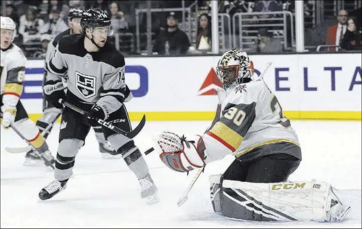  ?? Marcio Jose Sanchez ?? Knights goaltender Malcolm Subban stops a shot in front of Kings left wing and former teammate Brendan Leipsic during the second period Saturday in Los Angeles.
