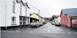  ??  ?? > The ‘tight-knit’ village of Llangammar­ch Wells