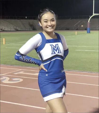  ?? Photo courtesy of Shelby Ah Wah ?? Maui High School senior Jadynne Zane started cheerleadi­ng as a freshman and it helped balance a demanding academic load that has included nearly a dozen Advanced Placement classes.